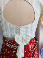 Close-up of matching bow and cut-out back