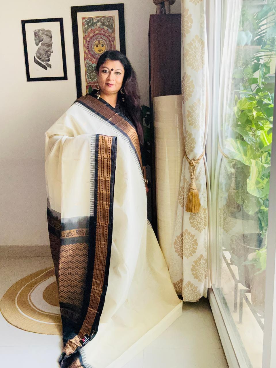 Handcrafted White Gadwal Cotton Saree with Bronze & Black Zari Border