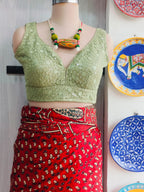 Front view of pista green sequin-embellished padded blouse