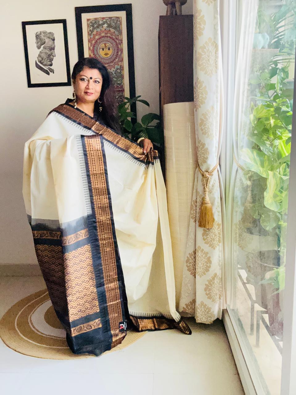 Handcrafted White Gadwal Cotton Saree with Bronze & Black Zari Border