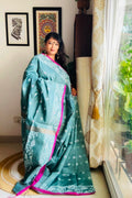 Handcrafted Teal Cotton Silk Bengal Jamdani Saree with Pink Border