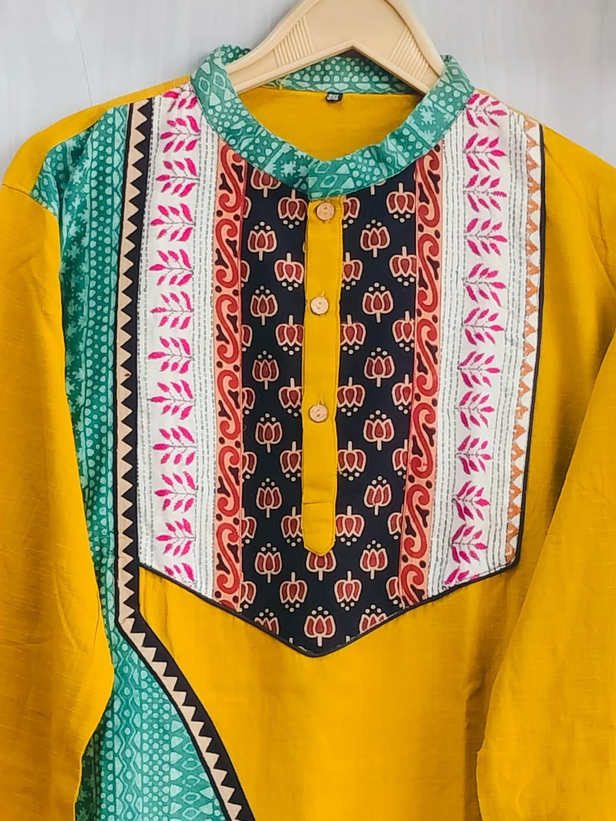Gents Handcrafted Ochre Yellow Cotton Kurta with Asymmetrical Ajrakh Panel