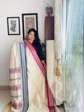 Handcrafted Cream Vidarbha Tussar Saree with Magenta & Blue Karvati Border