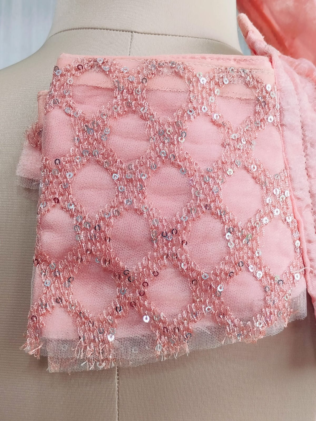Matching extra sleeve fabric included with the blouse